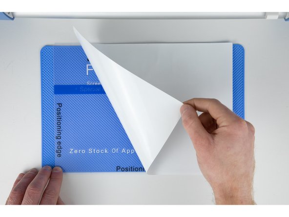 Peel the protective sheet off of the grip layer.