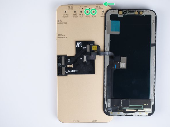 To recover the display, grab your original display and attach it to the testbox.  Hold down the 'RECOVER' key on the top right of the testbox. The 'READ' indicator light will flash green while the testbox reads the data from the original screen. When the 'READ' light is a constant green you can remove the original display.