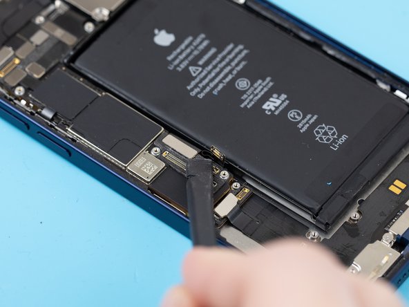 Using a spudger or your fingernail, disconnect the charge port connection flex.