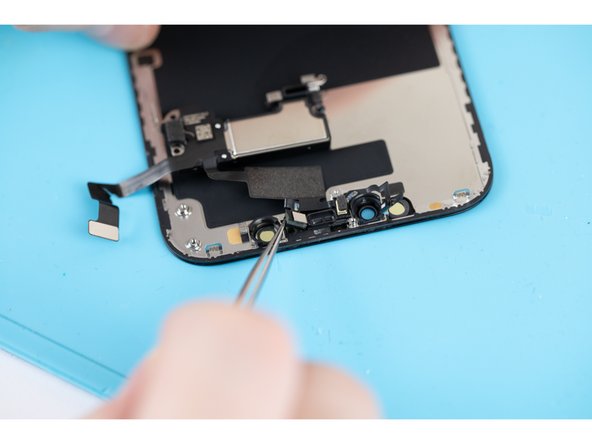 Once lifted away you can remove the earpiece speaker and front sensor assembly.