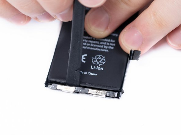 Gently unfold the BMS with a spudger.