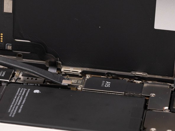 If you don't have a spudger, you can use your fingernails, but make sure they're clean.