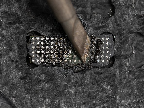 The most efficient way of removing the underfill is with the soldering iron on a slant and rubbing it in an up &amp; down motion.