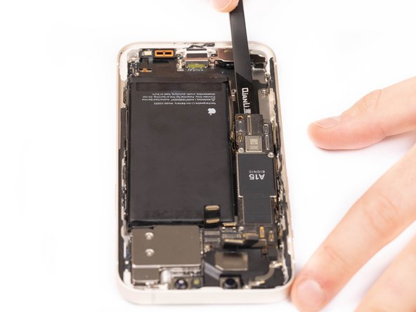 IMPORTANT DISCLAIMER: This guide has been made with a UK iPhone 13 Model A2633. If you are not from the UK you may have a different model which will have a 5G cable soldered to the back of your motherboard and runs underneath the battery.