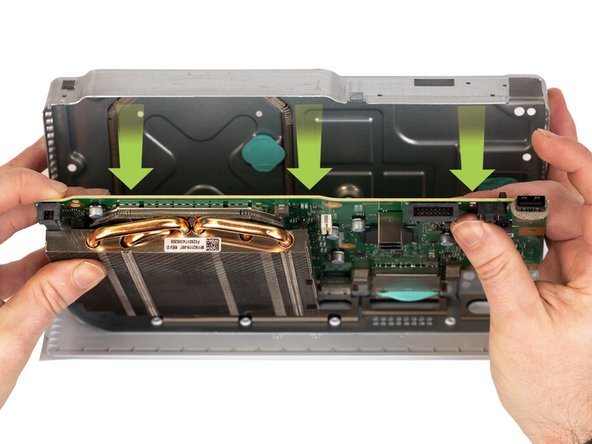 Holding the motherboard with your fingers, pull the motherboard out of the chassis frame.
