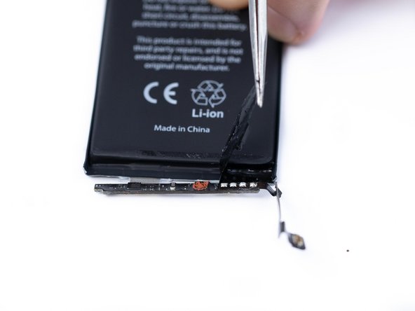 Remove the second protective sticker from the battery.