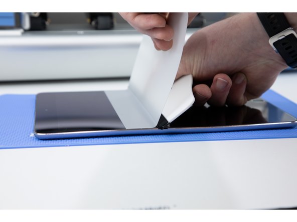 Using the same process as step 18, apply the film to the iPad.