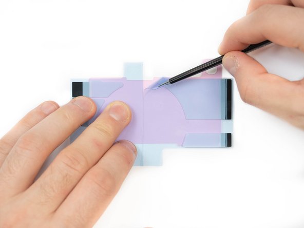 Peel the first protective liner of the adhesive away.