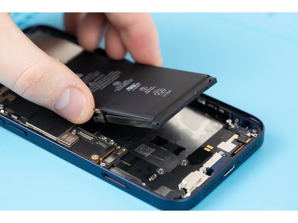 Remove the battery using your fingers.