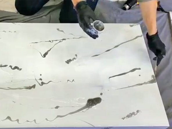 Use a small, clean wooden stir stick to help you control the light gray line of epoxy as you apply it.