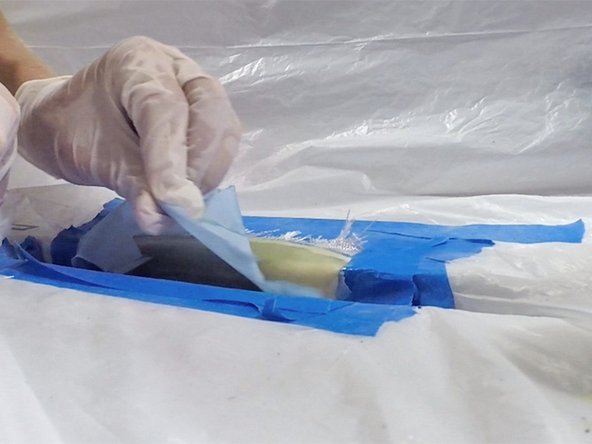 Remove peel ply: When the repair area cures completely, remove the peel ply slowly and carefully. Removing the peel ply also removes any amine blush and some of the excess epoxy.