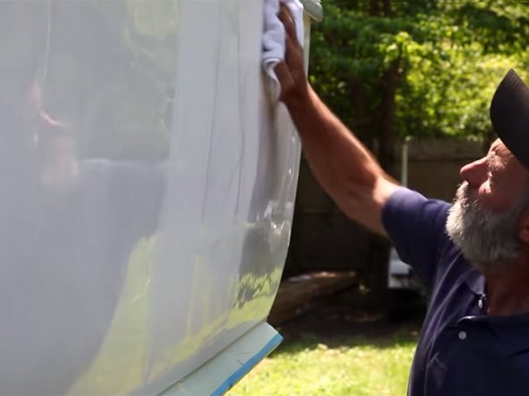 Rub off the wax with a clean soft microfiber cloth.