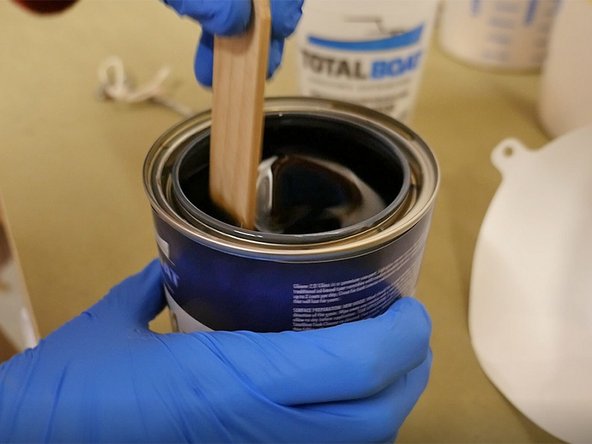 Stir the varnish gently from the bottom to the top — do not shake the can of varnish. Aggressive stirring or shaking will introduce bubbles in the varnish, which you definitely don't want.