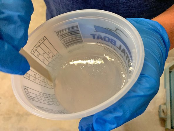 Use a clean tongue depressor and stir slowly to prevent air bubbles.