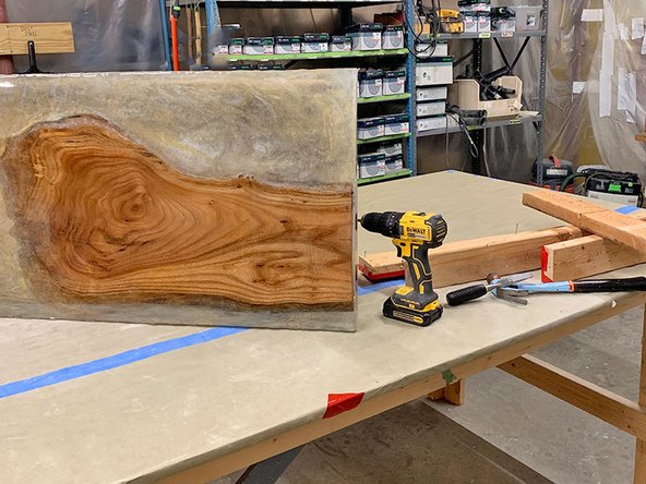 When the epoxy has hardened completely, carefully remove your river table from the mold.
