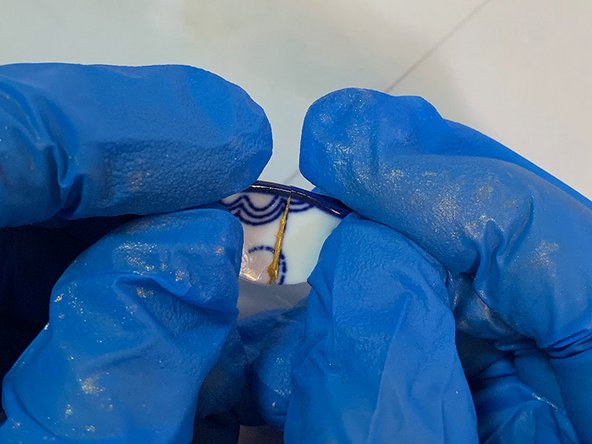 After gluing the larger pieces into one section, do the same for the smaller pieces, gluing them into one larger section.