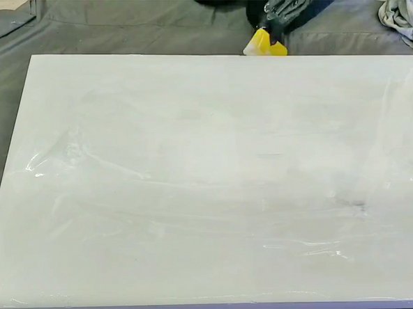 Use a clean plastic spreader to distribute the epoxy until it covers the top and surfaces at a uniform depth of about 1/8&quot;.