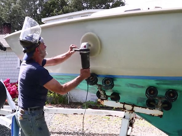 Buff with an electric buffer with a wool polishing pad attached. Continue this process until the entire surface is covered.