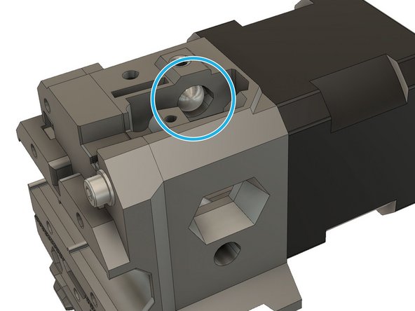 Insert the steel ball in the dedicated pocket of the extruder_body.