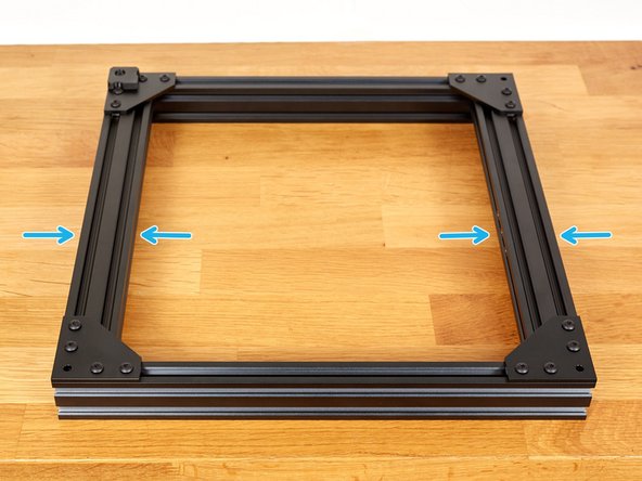 Take the second 370mm extrusion + plate assembly which you built in step 5. Attach it with 4x M5x10 screws. Do not tighten them fully yet!