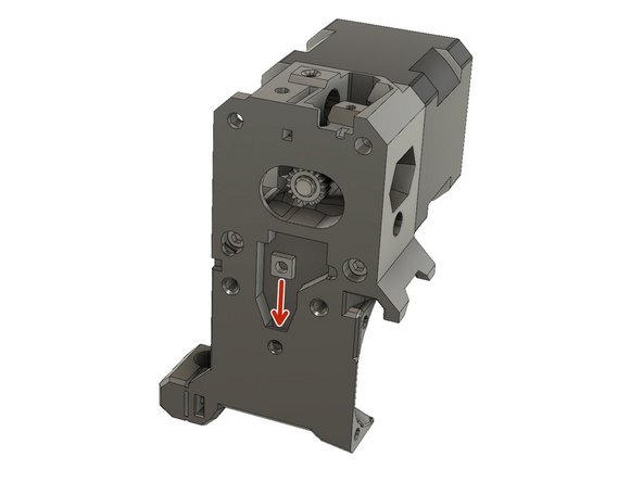 Slide a M3 square nut into the extruder_body.