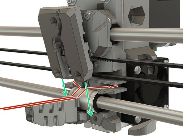 Slide the bottom of the x_carriage_back carefully over the cable bundle. Ensure that the cables are in their channels and that none of the cables are pinched against the x_carriage or x_carriage_back.