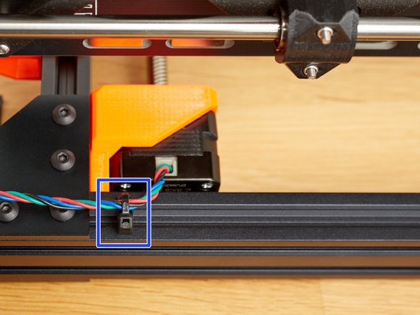 Attach the right Z motor wire to the cable_clip_vertical, with a zip tie, as shown.