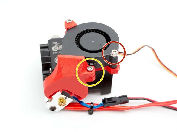 Tighten an M3x8 screw