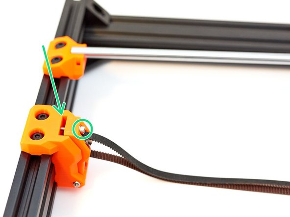 Unscrew the idler tensioner screw until there is a small gap (about 3mm).