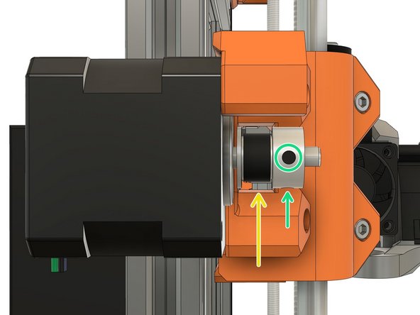 Loosen the two pulley set screws a little.
