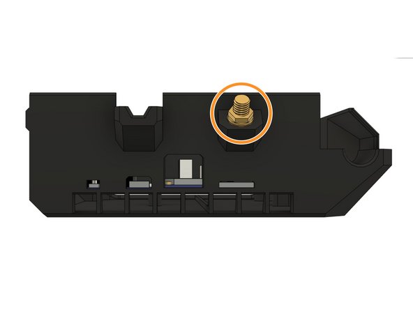 Insert the end of the antenna wire (has a hex nut on it) into the pocket on the case.