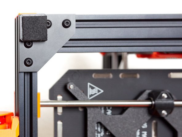 Stick the felt pads on the feet. Orientate them to have the protection on top of the screw.