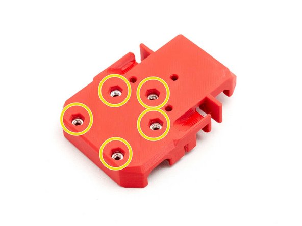 Insert five M3 hex nuts in the back of the x_carriage