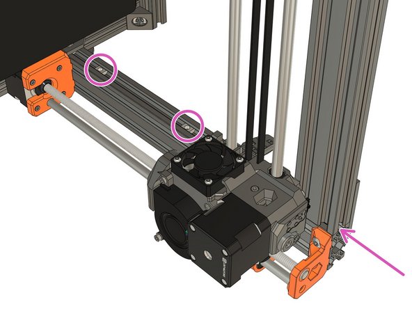Slide 2x t-nuts into the extrusion from the top of the frame, as shown.