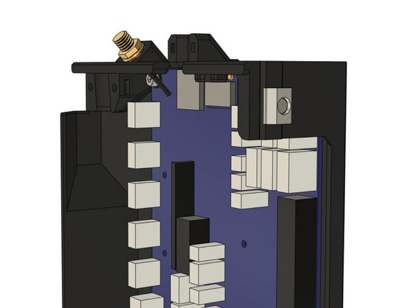 Loosely thread a t-nut onto the screw from the outside of the case. Do not tighten the T-nut to the case, as we will slide the T-nut into the Z extrusion on the frame.