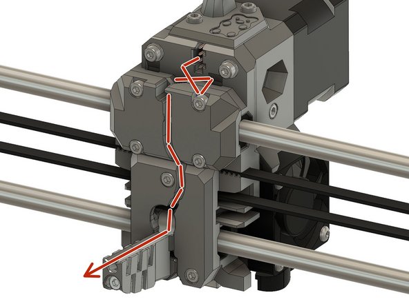 Clip the filament sensor cables on the filament sensor connector. The white wire of the cable should face up when connected to the filament sensor.