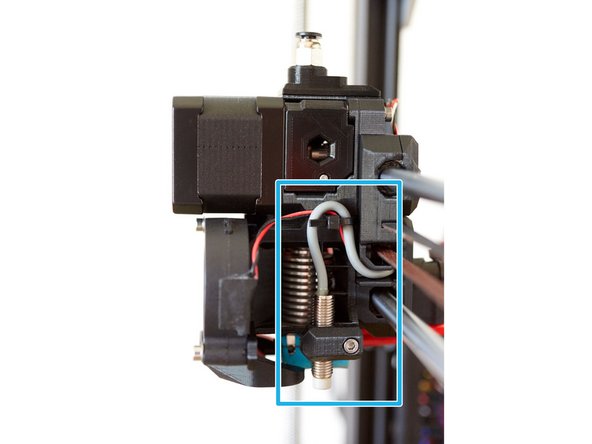 Insert the PINDA into the mount so that the sensor end is approximately 12mm below the bottom of the pinda_mount. Tighten the screw just enough to keep the PINDA from falling out. The optimum PINDA position will be adjusted later.