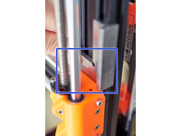 Adjust both M3x10 screws to have the x_end_idler parallel to the frame.