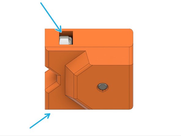 Press the dowel pin through the x_end_idler_idler_mount and idler bearings.