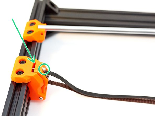 Unscrew the idler tensioner screw until there is a small gap (around 3mm).