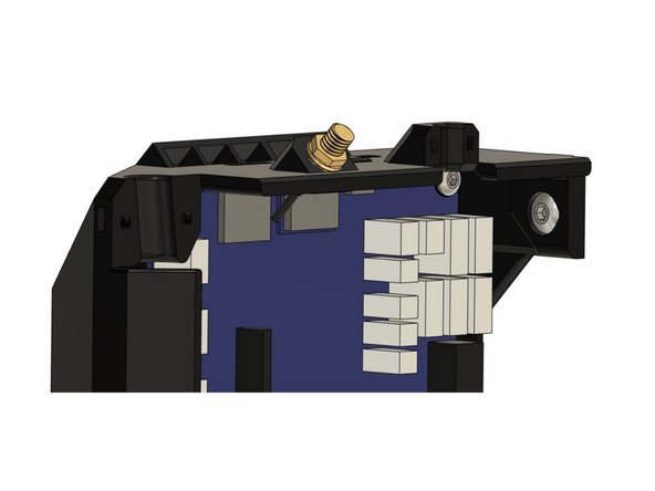 Insert a M5x8mm screw into the pocket on the top of the case. We will use this screw to secure the case to the Z extrusion on the frame.