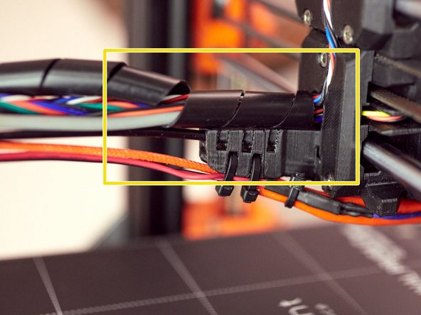 Wrap the wires coming out of the x_carriage_back using spiral wrap for 2-3 turns. The wrap should touch the x_carriage_back.
