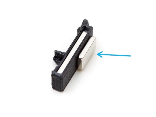 Insert the longer magnet (20x6x2mm) inside the filament_sensor_lever.