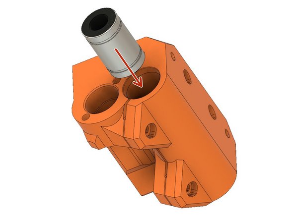 Insert an LM8UU linear bearing into the x_end_idler until it hits the internal stop.