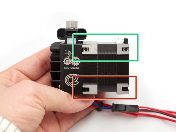 Insert two M3 square nuts on top front of stepper
