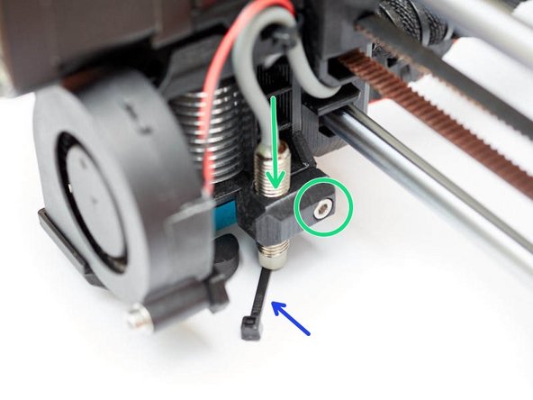 Center your extruder on the X axis. Move it down by rotating both Z lead screws simultaneously. Move the extruder down until the nozzle is just touching the paper.