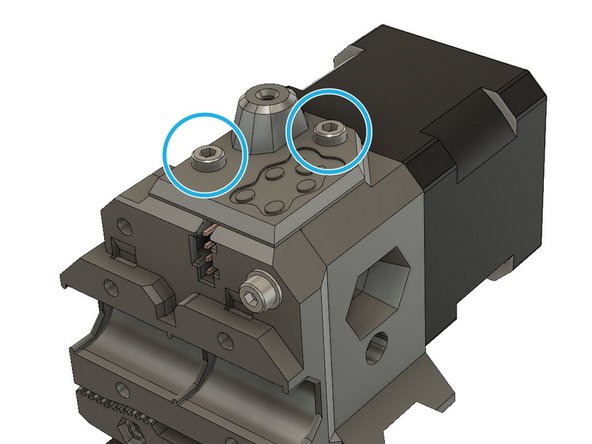 Use two M3x10 screws and the filament_sensor_cover to close the top of the extruder_body