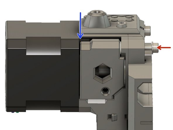 Insert the screw in the top left hole of the x_carriage until it is just protruding from the other side of the extruder_body.