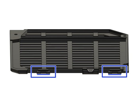 If they are still present, remove both printed supports from the tabs on board_lid.