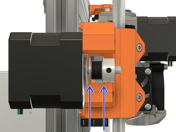 Loosen the two pulley set screws a little.